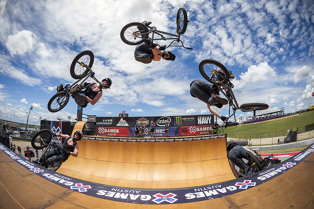 vince_byron_xgames_vert_barspin_to_one_footed_seatgrab_table.jpg