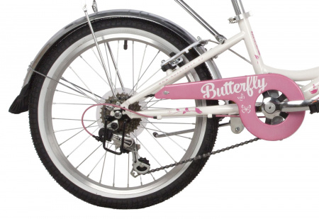 Велосипед NOVATRACK BUTTERFLY 20" (2022) (Велосипед NOVATRACK 20" BUTTERFLY сталь, белый-розовый, 6-скор, TY21/RS35/SG-6SI, V-brake, багажник)