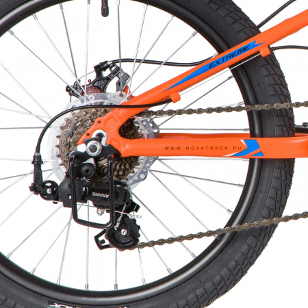 NOVATRACK EXTREME Disc 20" (2020) (Велосипед NOVATRACK 20" EXTREME, оранжевый, алюм., 7 скор., Shimano/MICROSHIFT DISC)