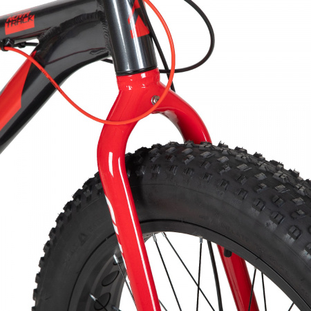Велосипед Novatrack Suv Fatbike 24" (2022) (Велосипед NOVATRACK FATBIKE 24" SUV алюм.рама 13, графит., 7-скор, TY200/TS38, диск.торм.STG)